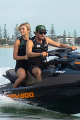 Jetpilot Vault Hyperflex Life Jacket — worn on a jet ski
