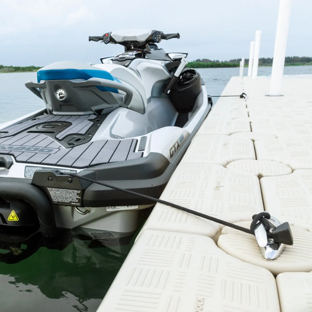 Sea-Doo Speed Tie 295100885 securing a watercraft alongside a dock
